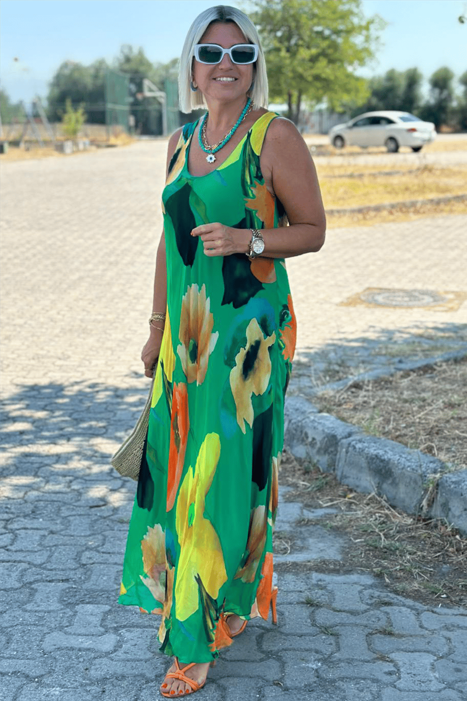 Maxi dress made of silk chiffon with a floral pattern and a U-shaped neckline
