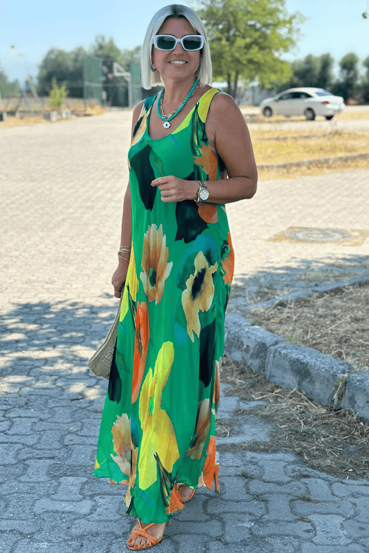 Maxi dress made of silk chiffon with a floral pattern and a U-shaped neckline